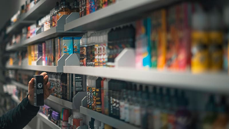Disposable vapes on a shelf